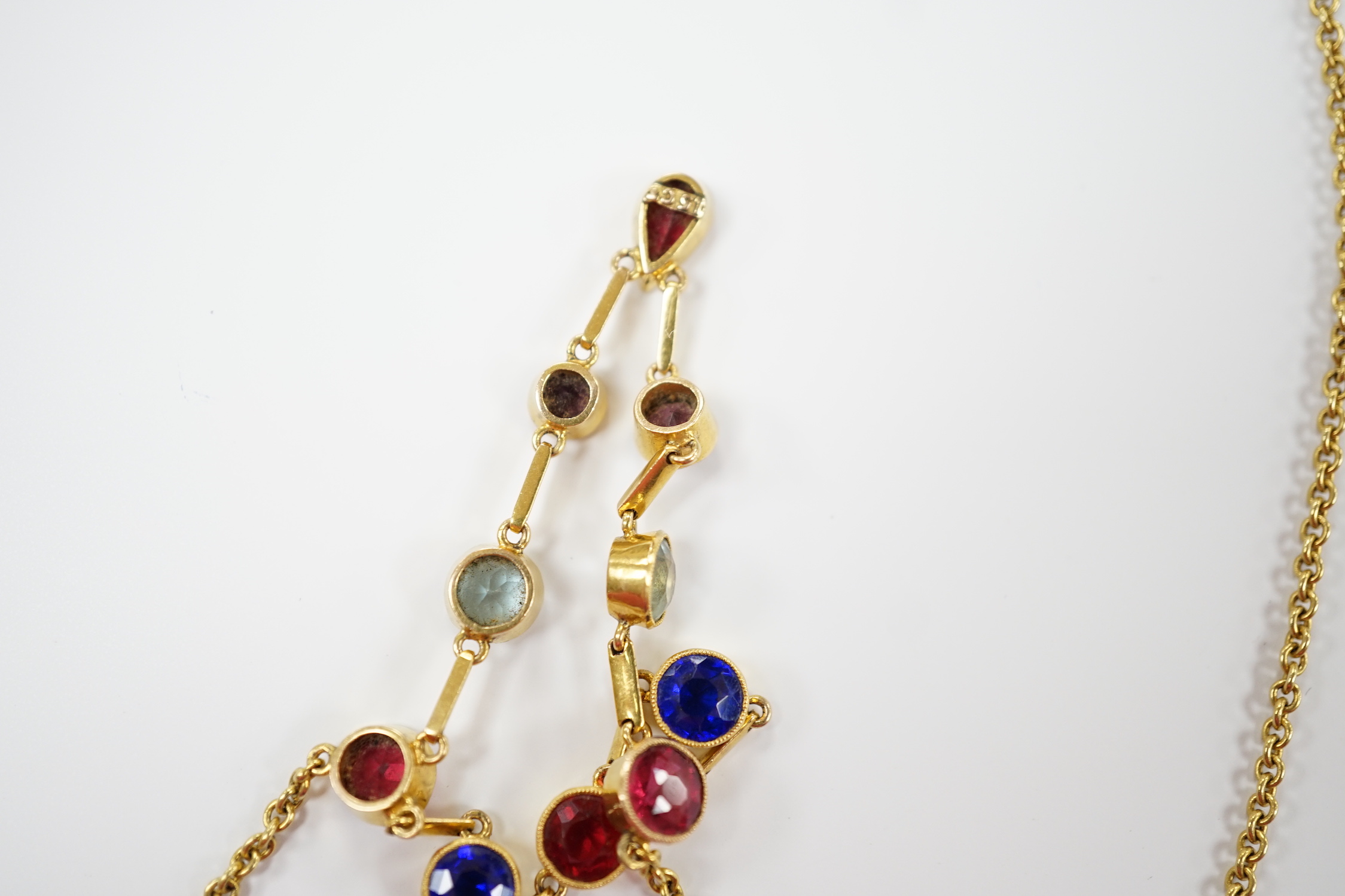 An early 20th century 15ct and ten stone multi coloured doublet set necklace, 49cm, gross weight 11.4 grams (the two pale blue stones appear not to be doublets?).